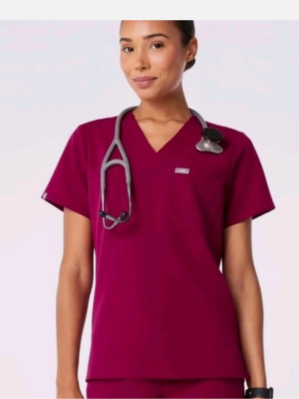 FIGS Women's V-Neck Scrub Top in dark magenta purple. Size small.